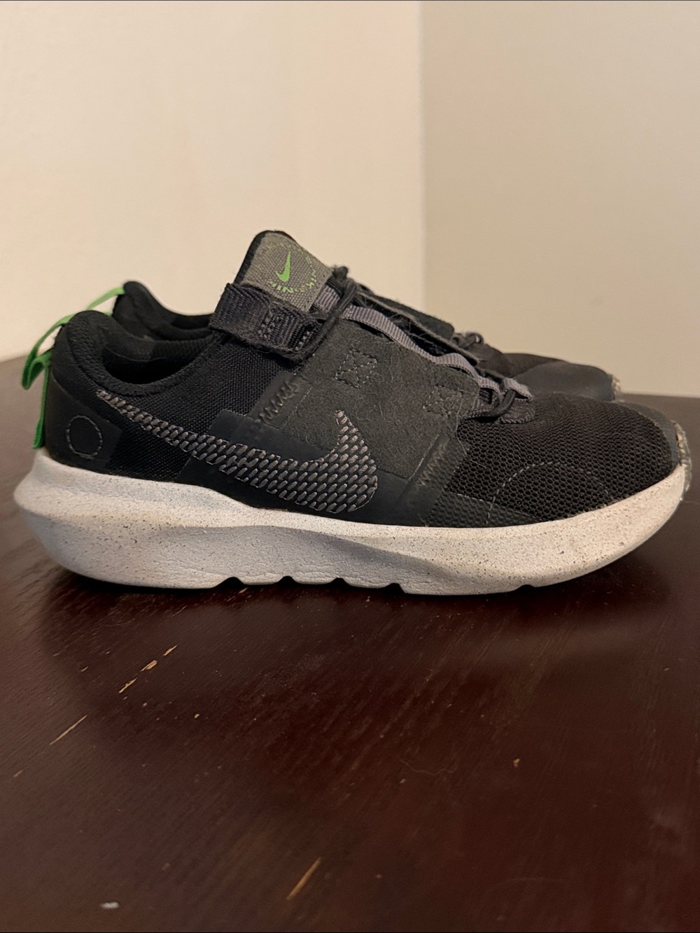 Nike Black Sneakers with Green Accents for Kids